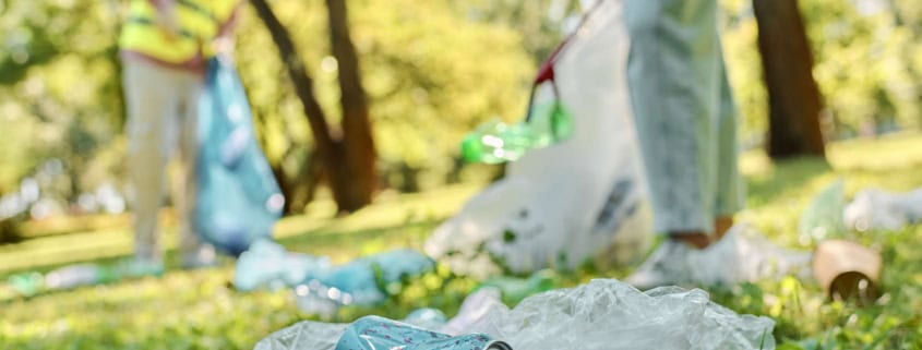 people litter picking on a sunny day